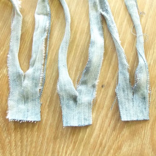 Blue jeans cut into strips to make yarn