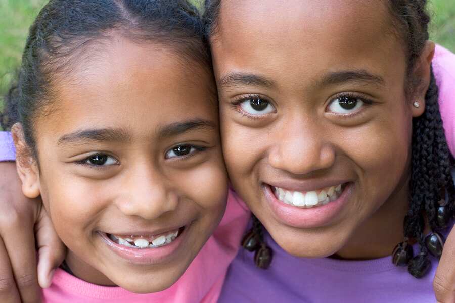 Smiling sisters