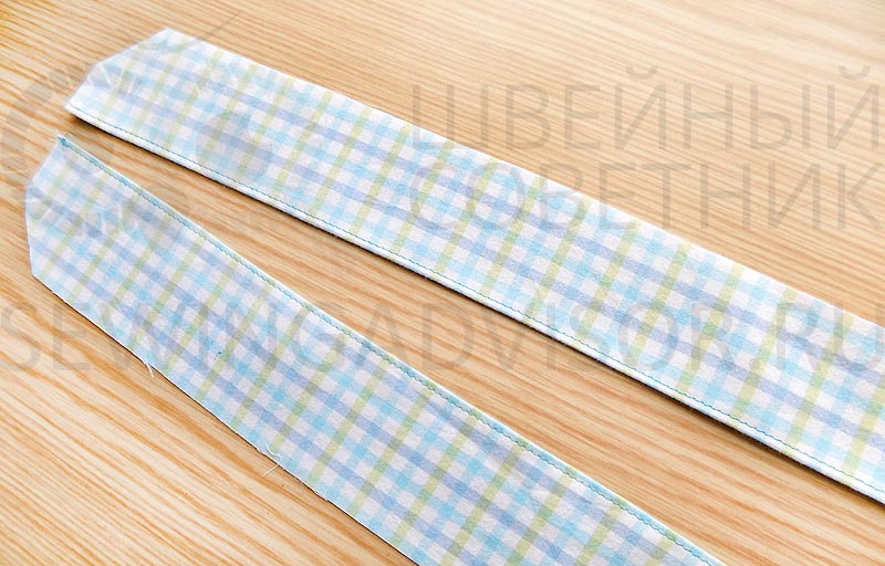 Подвернуть внешний край подбортов и пристрочить