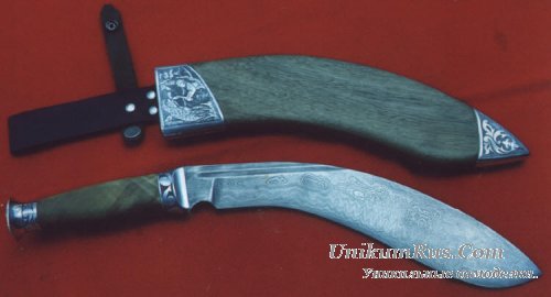 нож с рукоятью из фаллоса моржа